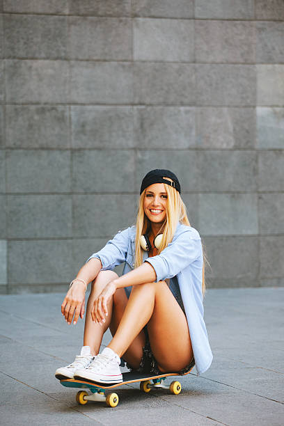 istock Young woman sitting on the skater 179777976