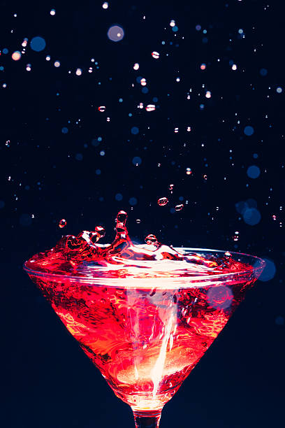 red splashing cocktail
