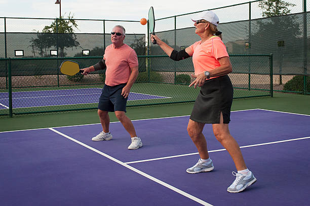 istock Mixed Doubles Pickleball Action - Forehand for the Point 179786693