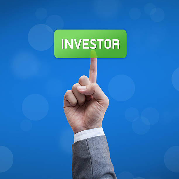 istock Investor business man press button 179787163