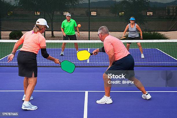 Two Teams Playing Pickleball Stock Photo - Download Image Now - Pickleball, Sports Court, Adult