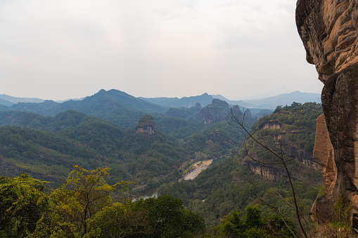 Uniquely shaped rocks around Wuyishan Scenic area, Fujian, China. The photo taken from Da Wang Peak, copy space for text