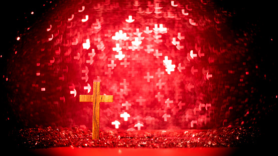 Religious cross on shiny backgrounds.