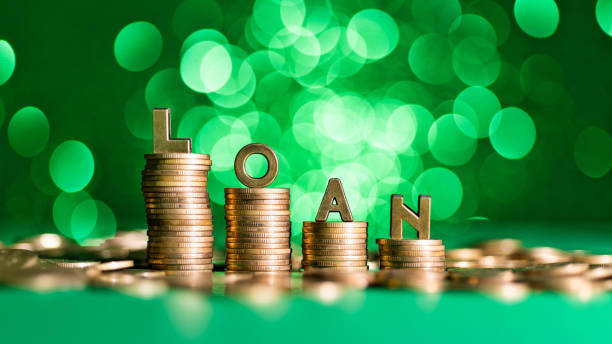 istock Word loan on stack of coins 1797924117
