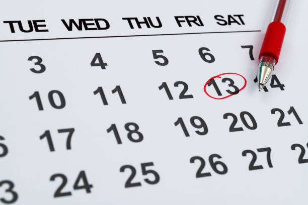istock Red mark on the calendar at number 13 1797925706