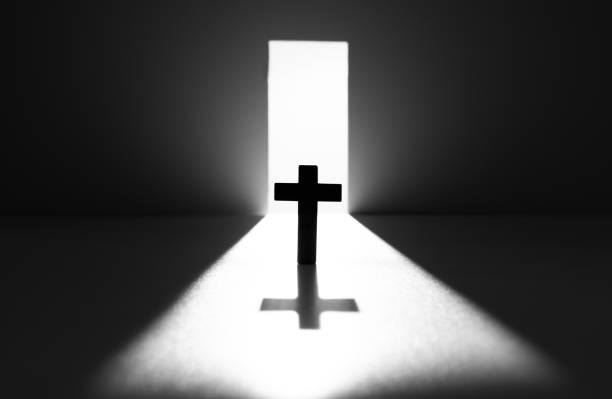 Open door with a religious cross