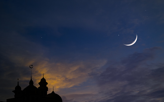 Night sky with crescent moon and stars of Ramadan sky.  Mosque dome, Islamic landmark.mosque dome of light of hope arabic islamic architecture Concept Religion islam