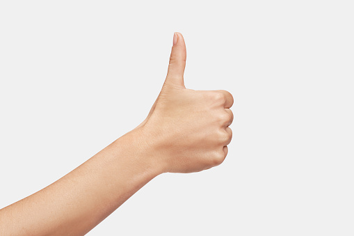 Woman's hand making ok sign