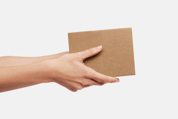 istock Hands delivering a carton box 1797971470
