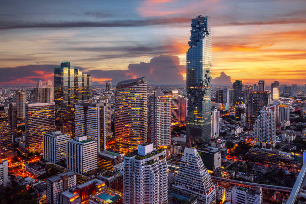 Morning sunrise view of Bangkok city in ratchaprasong area from window of Baiyok hotel room stock photo