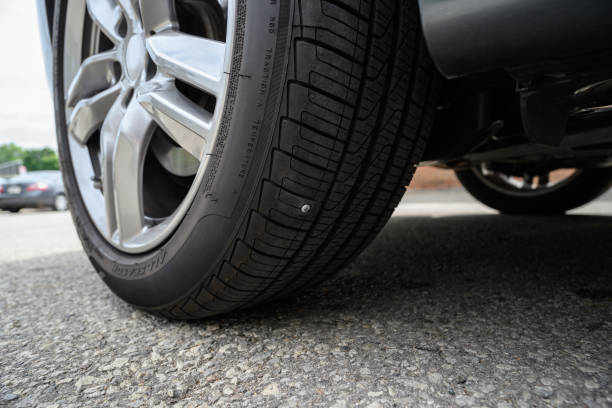 istock Tire Puncture By Screw 1798022392