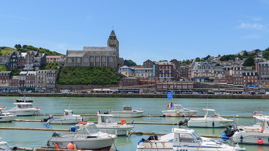 Le Treport, France - July 13, 2022: The city of Le Treport on a sunny day in summer, harbor and church