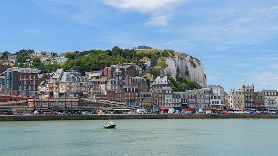 Le Treport, France - July 13, 2022: The city of Le Treport on a sunny day in summer, cliffs