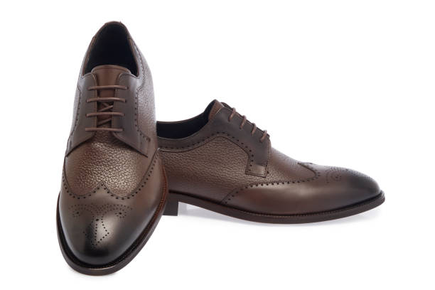 istock Brown Leather Shoes On White Background 1798106799