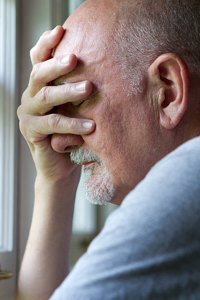 istock Older man expressing pain or depression 179812739