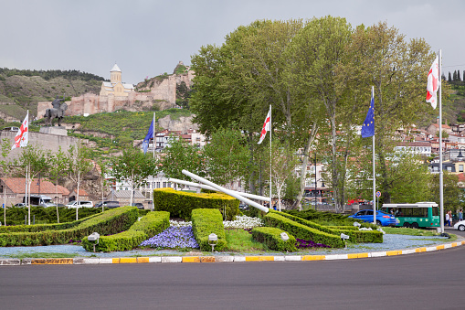 Tbilisi, Georgia - April 28, 2019: Street view with Tbilisi Europe Square on a daytime