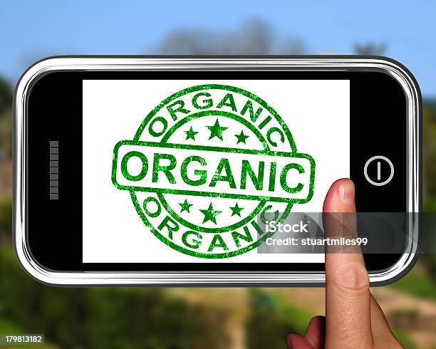 Organic On Smartphone Shows Ecological Products Stock Photo - Download Image Now - Certificate, Environment, Food