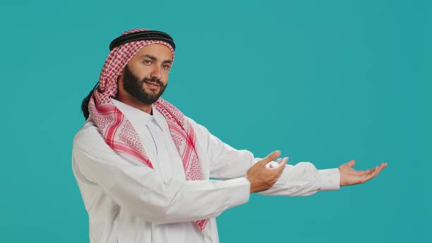 istock Muslim guy wearing traditional robe 1798144423