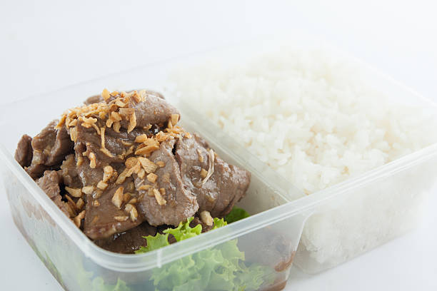istock Thai take away food, garlic beef with rice 179814599