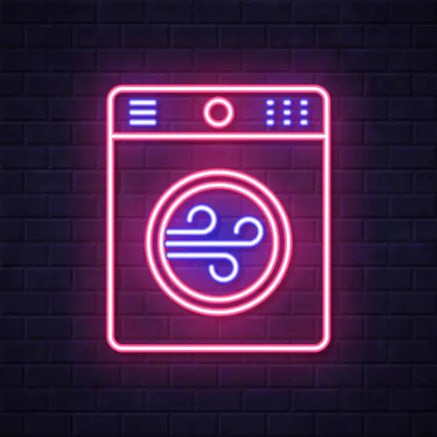 Vector illustration of Tumble dryer. Glowing neon icon on brick wall background