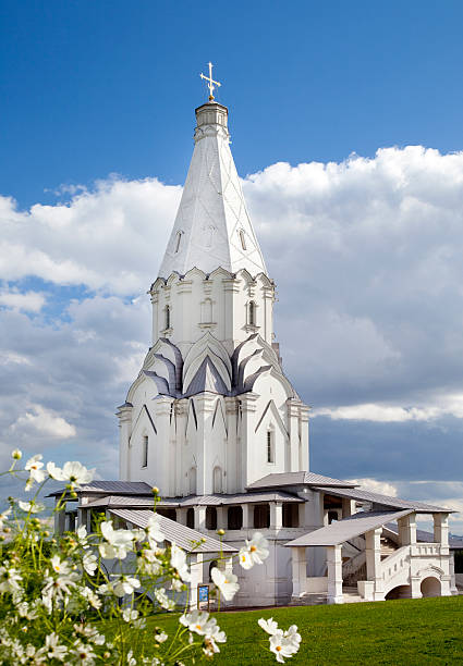 istock White Temple and Cosmos flowers 179814807