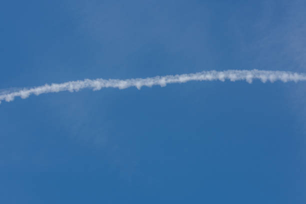 istock trace from an airplane on deep blue sky 1798160333