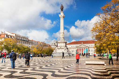 5 March 2018: Lisbon, Portugal - Historic Rossio Square, with the Column of Pedro IV, on a sunny day in early spring.