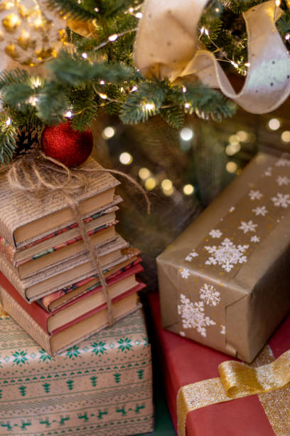 istock Gifts and books under Christmas tree. Boxing Day. vertically 1798187430