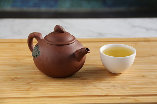 Green tea and teapot
