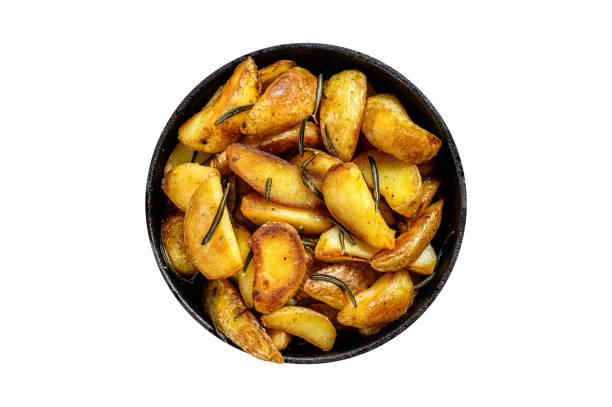 istock Roasted potato wedges with herbs and rosemary.  Isolate, white background. 1798253163