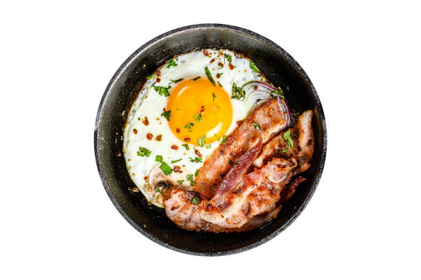 istock English breakfast, fried egg, tomatoes, mushrooms, bacon.  Isolated, white background. 1798253242