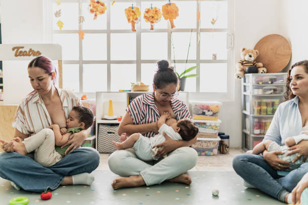 istock Mothers breastfeeding their babies in support group 1798259229