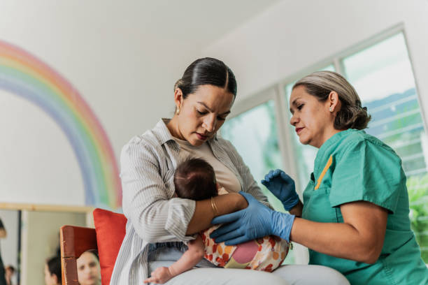 istock Mature woman learning to breastfeed her daughter in support group 1798280442