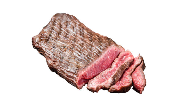 istock Grilled Flap or Flank Steak, sliced on a plate.  Isolated, white background. 1798282646