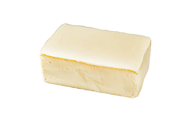 istock Butter block in steel kitchen tray.  Isolated, white background. 1798282668