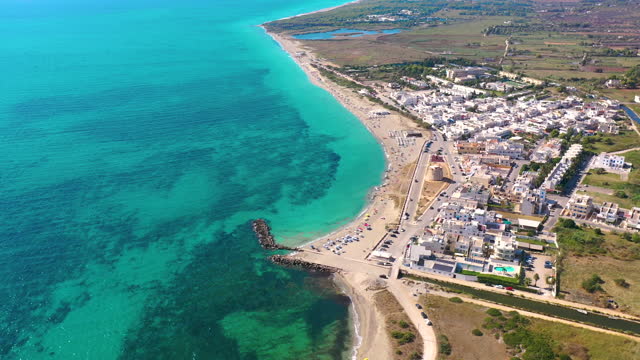 Aerial View of Paradise Beach with Turquoise Sea in City of Puglia, Italy