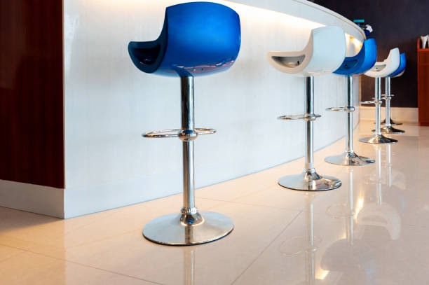 istock Blue and white bar chairs in a row 1798298156