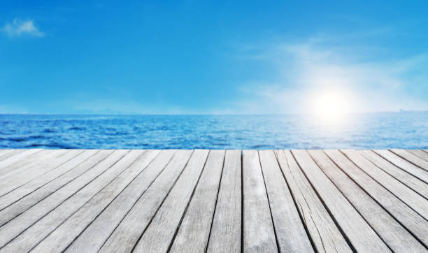 Wood platform beside the sea for background