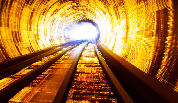 istock Train moving fast in tunnel with blurred motion 1798299245