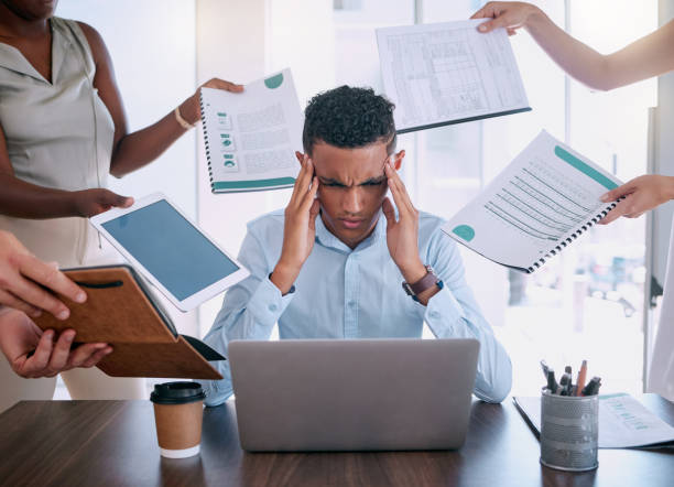 istock Business man tired from workload, management of time schedule project priority and employee burnout. Anxiety depression headache, company mental health care awareness and coworkers proposal deadline 1798342314
