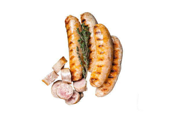 istock Roasted Bratwurst and Bockwurst pork meat sausages in a plate.  Isolated, white background. 1798343498
