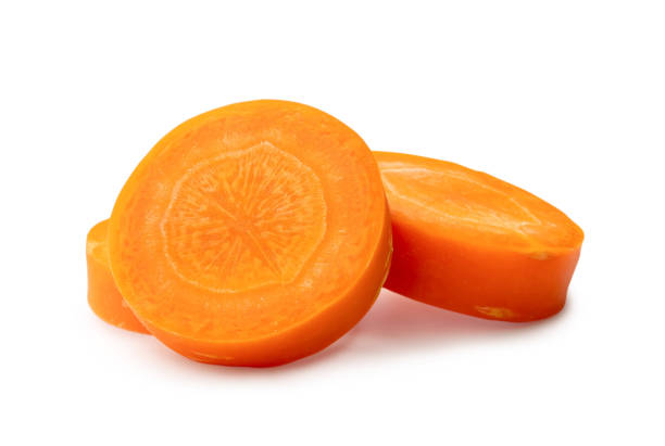 Beautiful orange  carrot slices in stack isolated on white background with clipping path