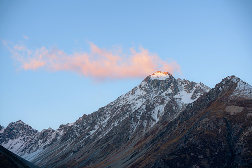 The last light of day falls upon the peak of Mt Cook/Aoraki, on New Zealand's South Island.