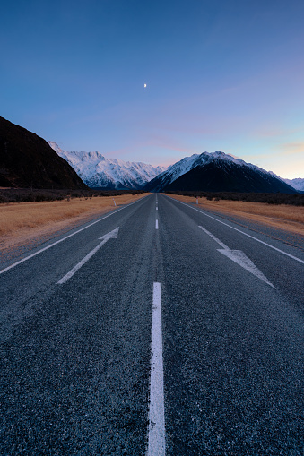 Dawn approaches as we look down the road that runs through the Mt Cook National Park, on New Zealand's South Island