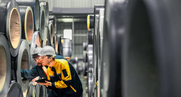 istock Metal sheet workers perform routine quality checking, enhancing assurance in roofing infrastructure 1798367444