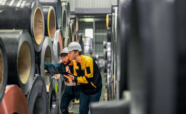 istock Metal sheet workers perform routine quality checking, enhancing assurance in roofing infrastructure 1798378551