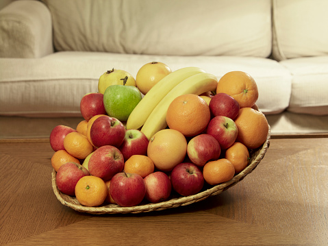 bowl of mixed fruits in bright colors, shallow dof