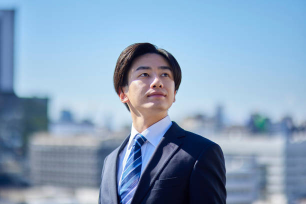 istock young Japanese man wearing a suit 1798434558