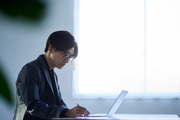 istock Japanese man working in the office 1798436849