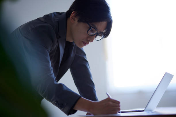 istock Japanese man working in the office 1798436887